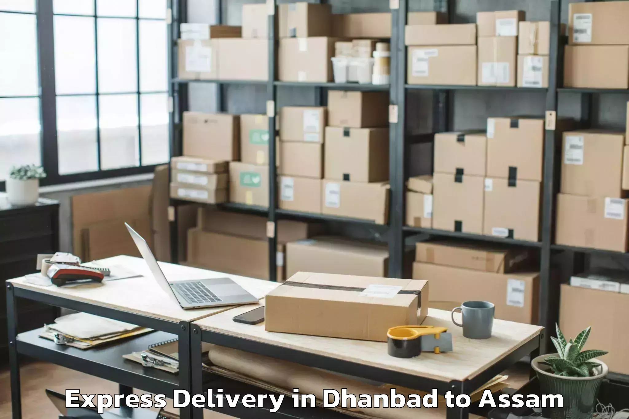 Book Dhanbad to Chaboti Express Delivery